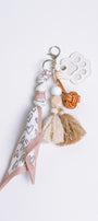 White Dog Paw Bag Charm