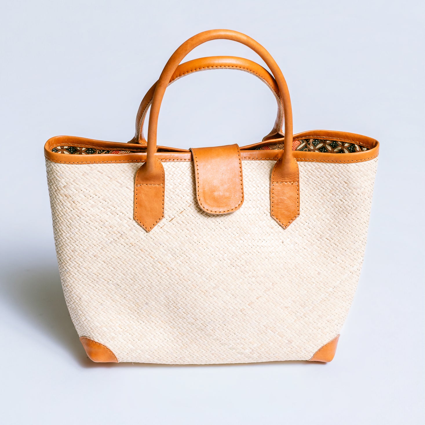 The Winding Road Rolled Leather Handle Rattan Tote